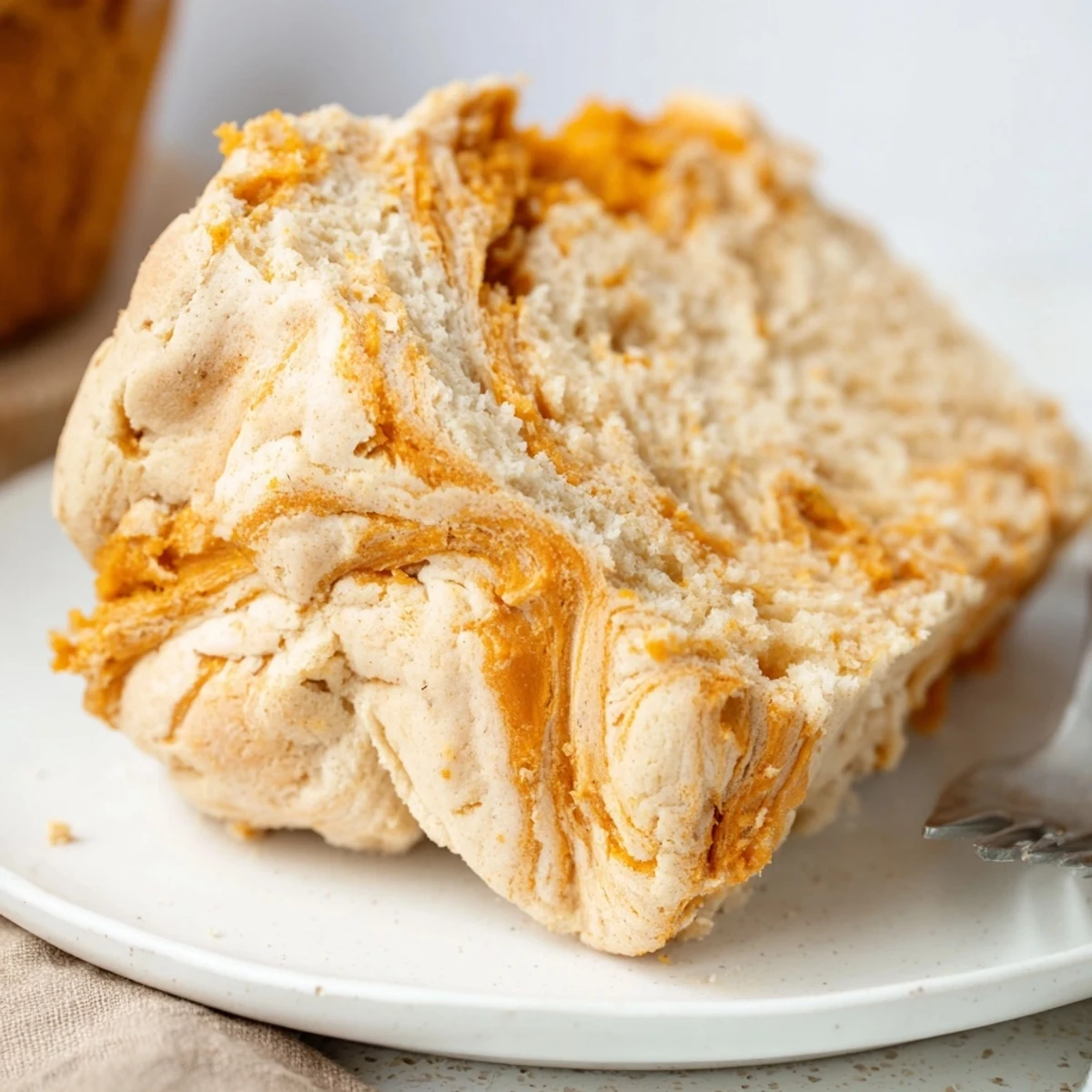 A delicious Cream Soda Sweet Potato Biscuit Loaf topped with a golden biscuit crust.  