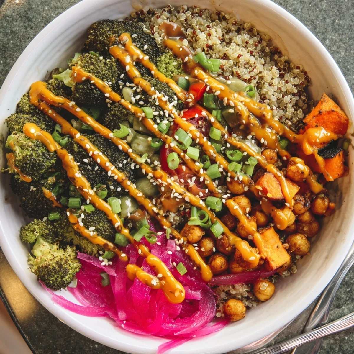 Vibrant Bold Sauce Drizzle Bowls topped with roasted veggies and unique sauces.