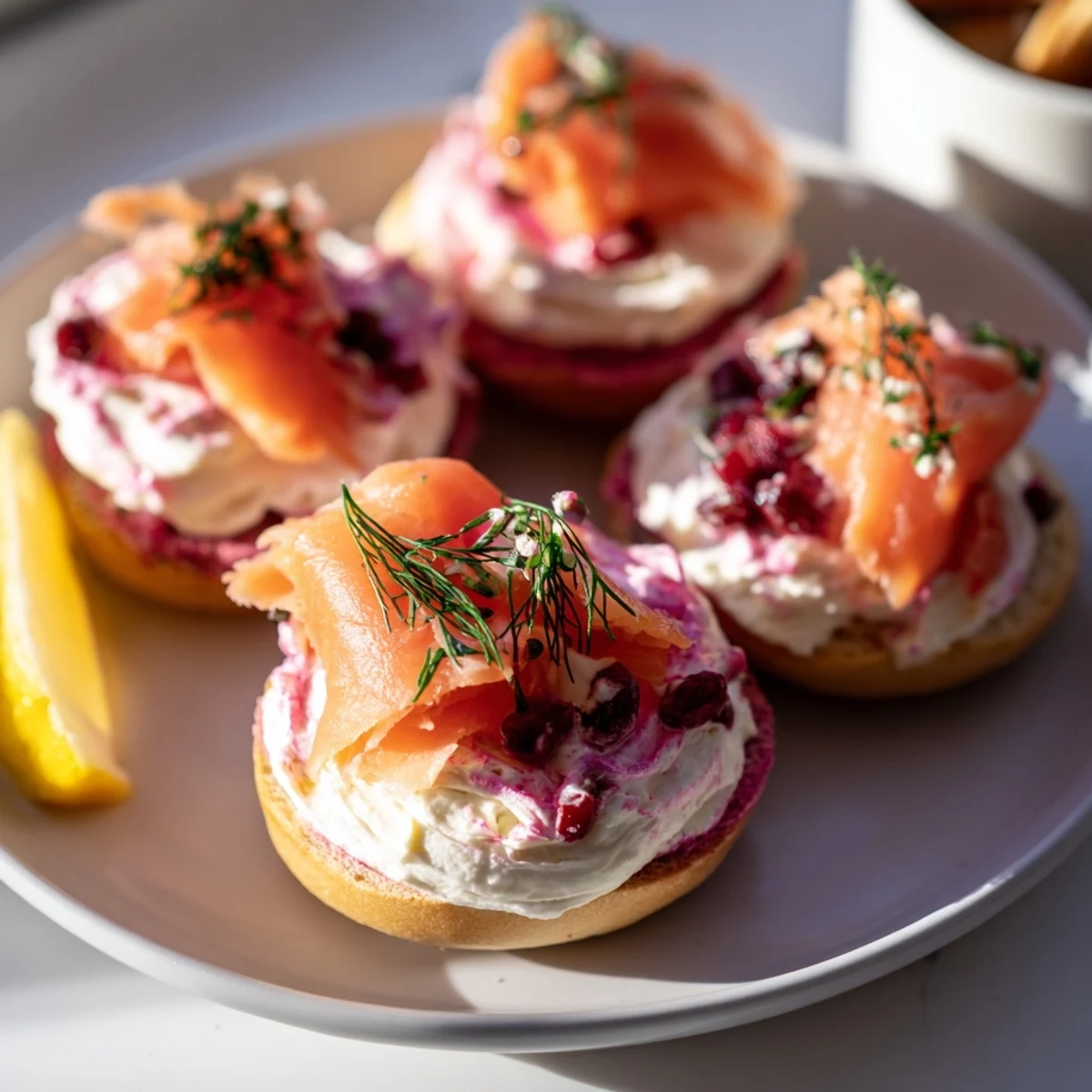 Sharing-style cranberry sleigh bagel board offering a colorful variety of brunch essentials, ready to enjoy.