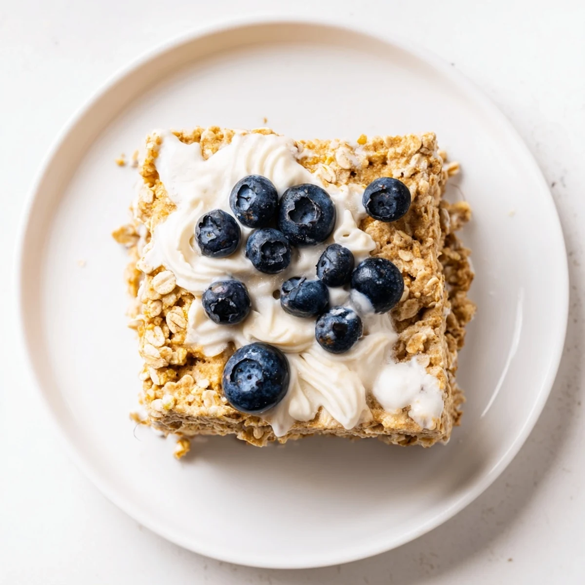 Fluffy Protein Pancake Oats baked to golden perfection with fresh blueberries, a hearty breakfast.