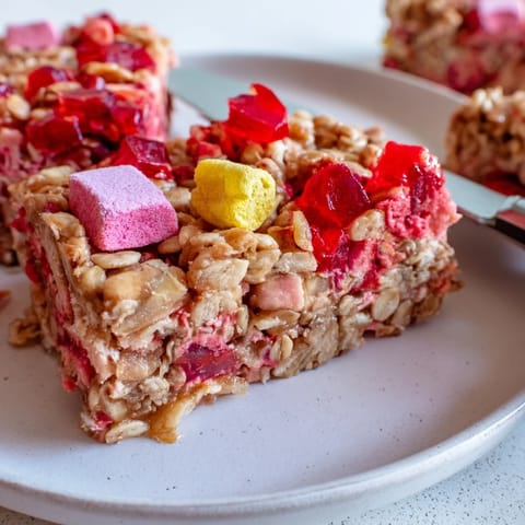 Colorful Homemade Gummies atop a wholesome oat base, perfect for snack enthusiasts.  