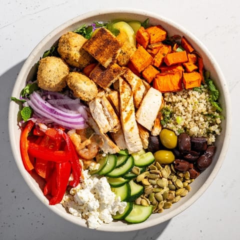 Guests creating personalized meals with vibrant veggies and protein options from this recipe.  