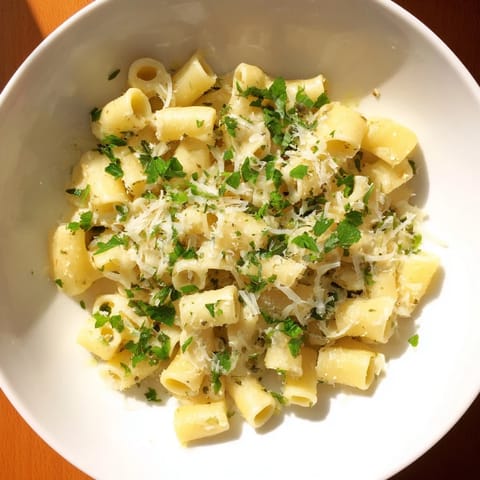Creamy, golden One-Pot Garlic Butter Ditalini garnished with fresh parsley, a comforting Italian dinner.