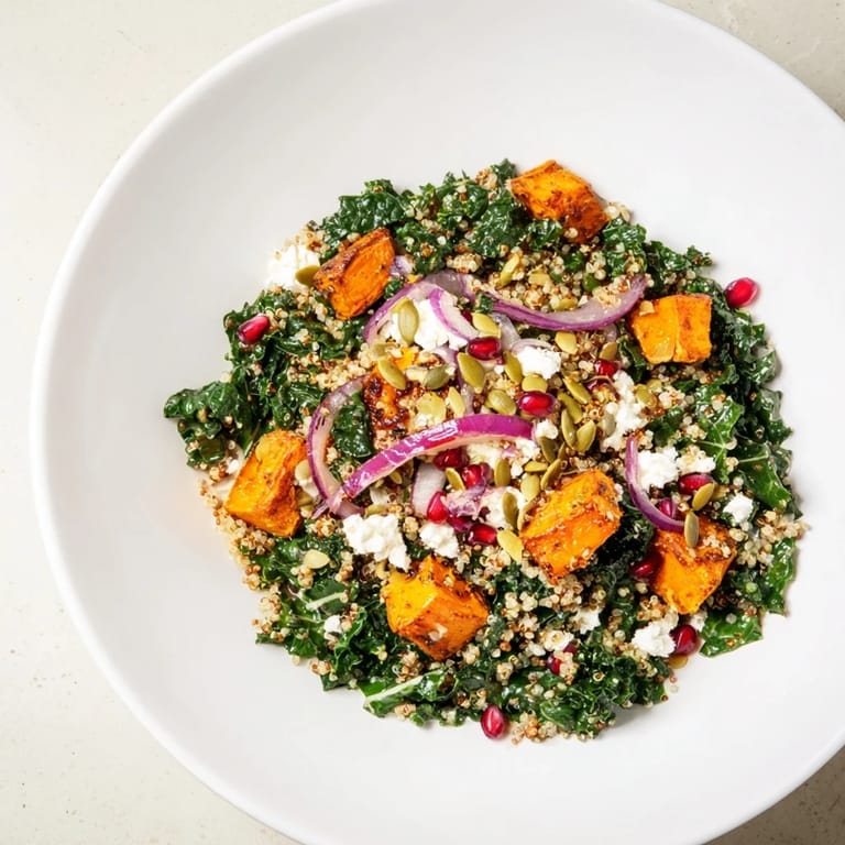 A bright, close-up view of the Kale & Quinoa Salad with a beautiful lemon dressing.